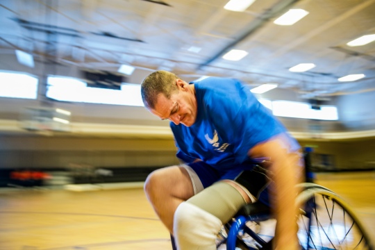 U.S. Air Force recovering service members practice drills at wheelchair basketball during the Wounded Warrior Adaptive Sports and Reconditioning Camp, Joint Base San Antonio-Randolph, Texas, Jan. 20, 2015. More than 80 Air Force recovering service members from around the nation participated in the weeklong adaptive sports camp. For many of the competitors, this is the first training event prior to participation in the 2015 Air Force Trials followed by the Warrior Games in mid-2015. (U.S. Air Force photo by Tech. Sgt. Sarayuth Pinthong Released)