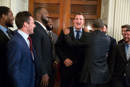 President Barack Obama jokes with tight end Rob Gronkowski, as he greets the New England Patriots in the State Dining Room, prior to an event to honor the team and their Super Bowl XLIX victory, on the South Lawn of the White House, April 23, 2015. (Official White House Photo by Pete Souza)